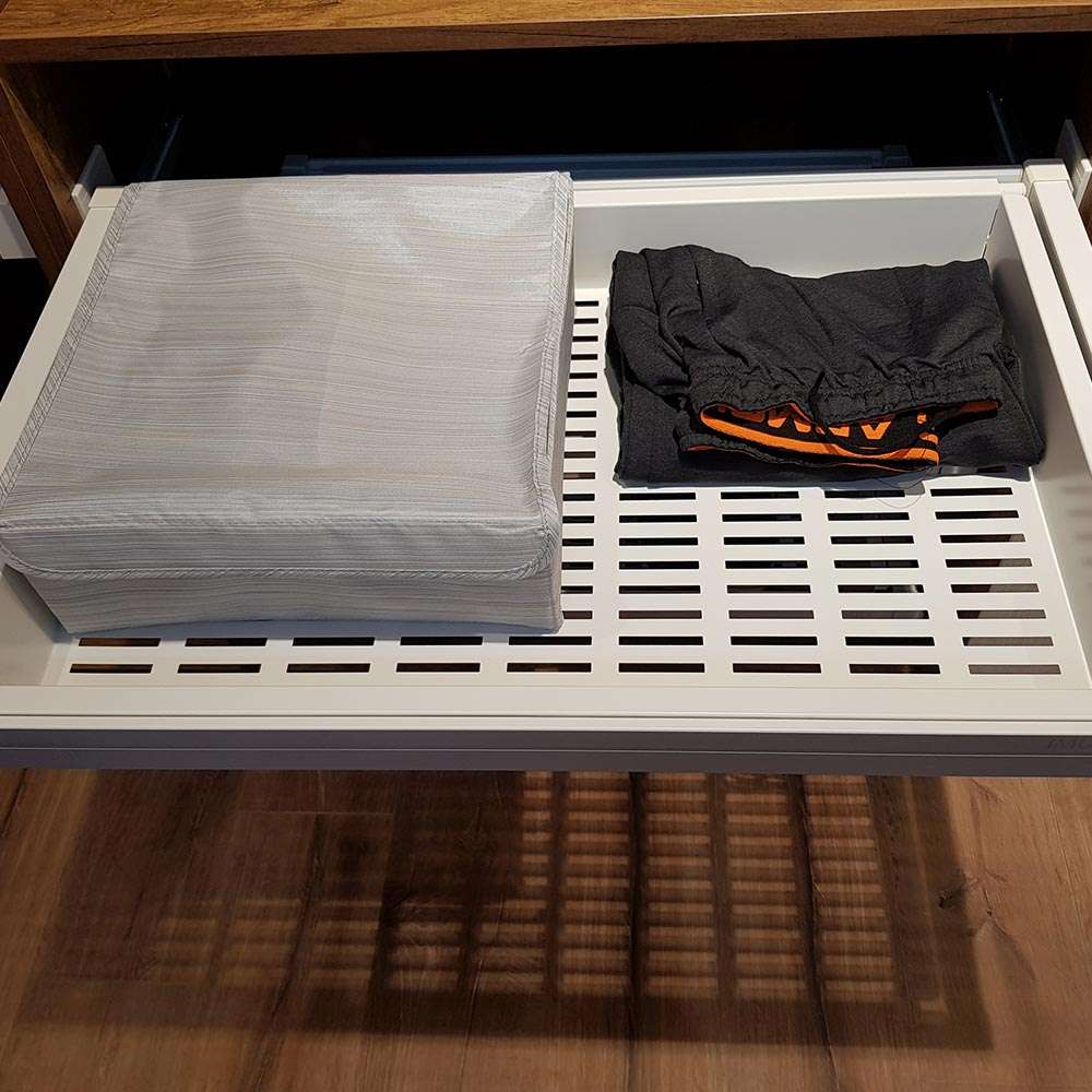 Storage basket with soft-close slides